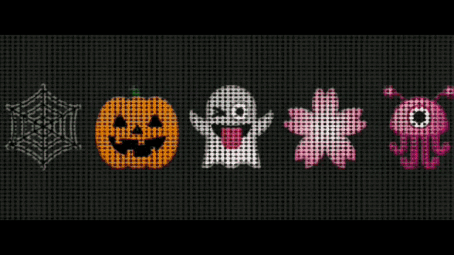 a spider web a pumpkin a ghost and a pink flower