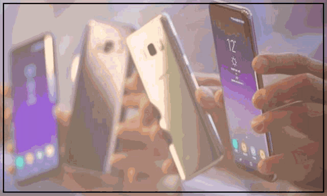 a person is holding a cell phone with the time of 12:12 on the screen