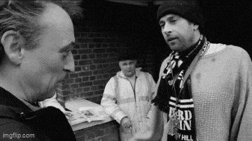a man with a scarf around his neck that says lord pain