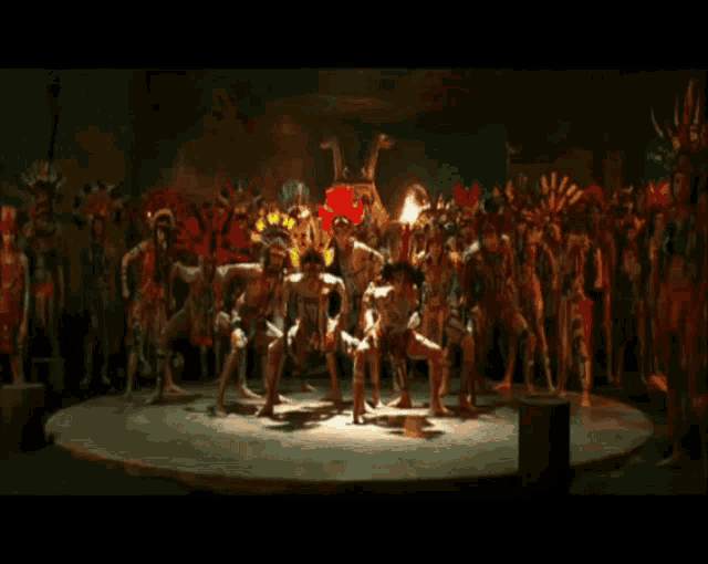a group of people are dancing in front of a sign that says houba houba houba houba houba