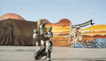 a sign that says pirates of the myland is in front of a robot