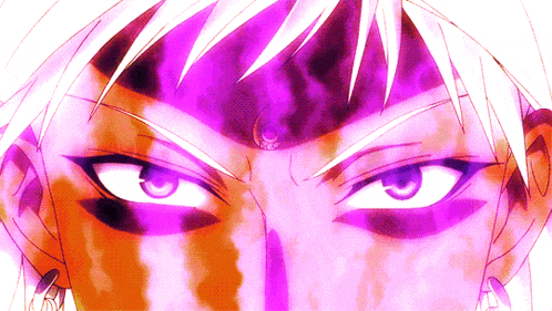 a close up of a person 's eyes with a purple glow