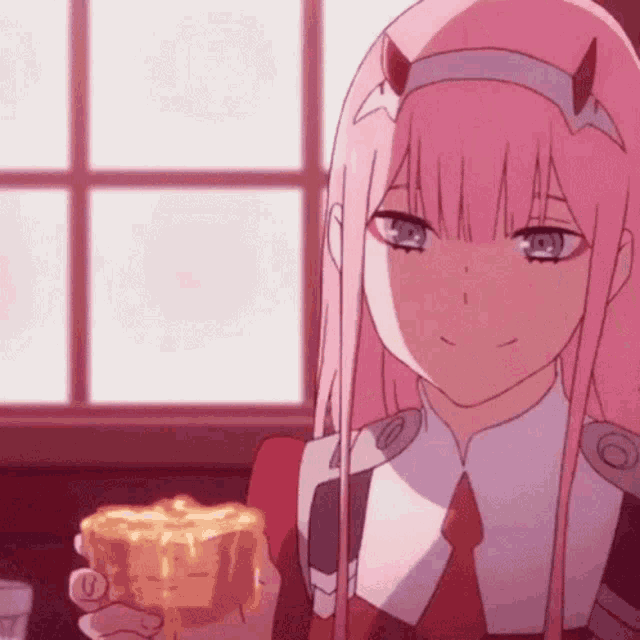 a pink haired anime girl is holding a cup of honey