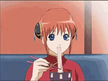 a girl with red hair is eating a bowl of food with chopsticks .