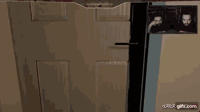 a picture of a man with a beard is on a wall with the words unboxholics on it
