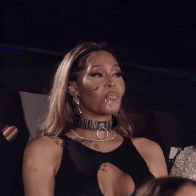 a woman wearing a choker that says " i love you " on it