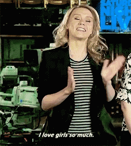 a woman says i love girls so much in a striped shirt
