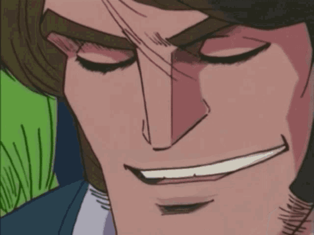 a close up of a man with his eyes closed