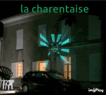 a car is parked in front of a building that says la charentaise on it