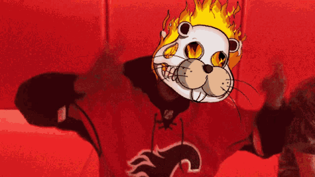 a cartoon drawing of a beaver wearing a red jersey with flames on its face