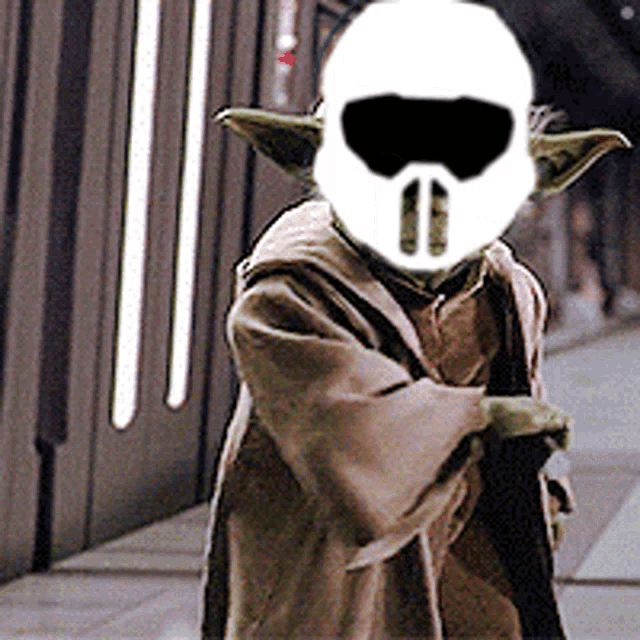 a picture of yoda wearing a white helmet and sunglasses