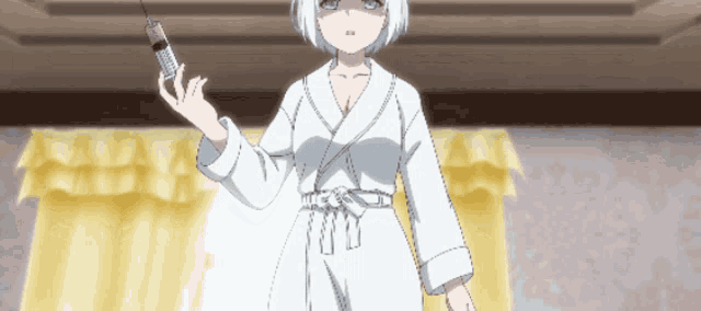 a girl in a bathrobe is holding a syringe in her hand