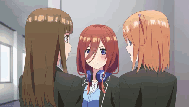 three anime girls are standing next to each other and one of them has headphones on