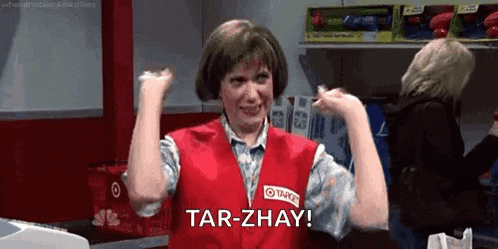 a woman in a target uniform is flexing her muscles and says tar-zhay .