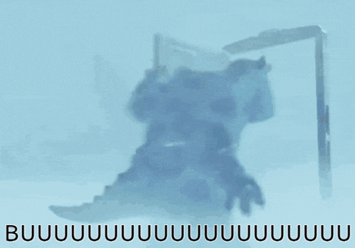 a monster from the movie monsters inc is walking through a door