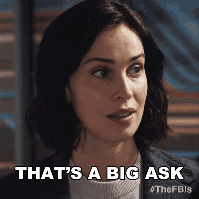 a woman says " that 's a big ask " in front of a blue background