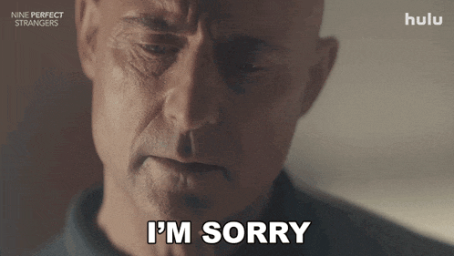 a man says " i 'm sorry " in front of a hulu logo