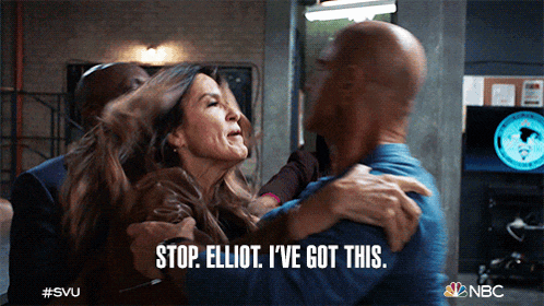 a man and a woman hugging with the words stop elliot i 've got this on the bottom