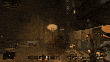 a man in a black coat is playing basketball