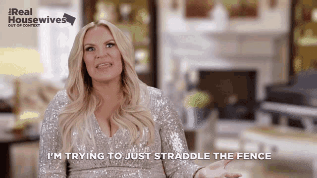 a woman says i 'm trying to just straddle the fence