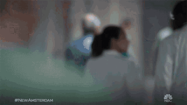 a blurry picture of a person with the words #newamsterdam on the bottom