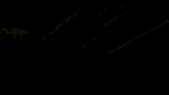 a yellow brick wall with a red arrow pointing to the right