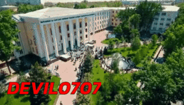 an aerial view of a large building with the words devilo707 in red