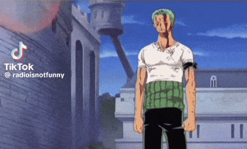a man in a green and white shirt is standing in front of a building with a castle in the background ..