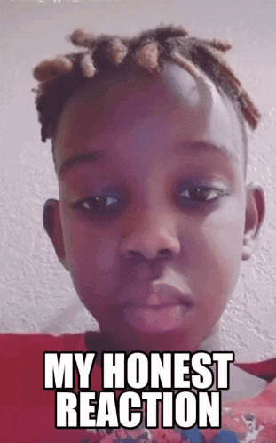 a young boy with dreadlocks is making a face with the caption my honest reaction