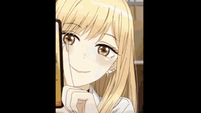 a girl with blonde hair and red eyes is holding a phone