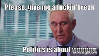 a man in a suit and tie says " please give me a fuckin ' break "
