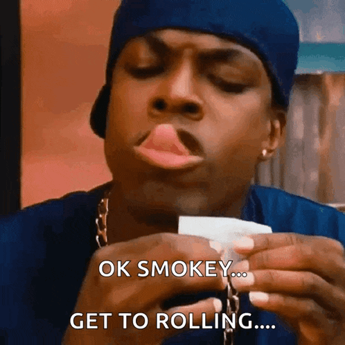 a man is smoking a cigarette and says " ok smokey get to rolling ... "