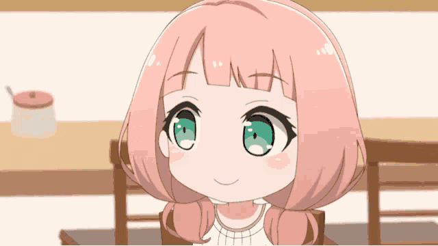 a little girl with pink hair and green eyes