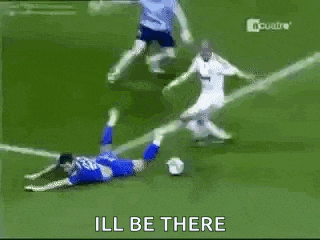 a soccer player is laying on the field with the words `` ill be there '' written on the screen .