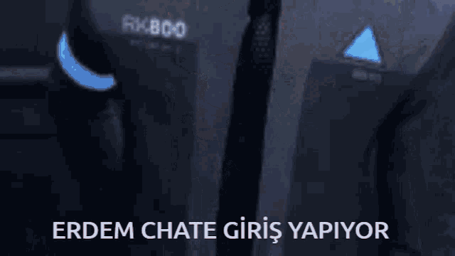 a man in a suit and tie says erdem chategiris yapiyor
