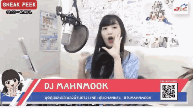 a woman speaking into a microphone with the name dj mahnmook on the bottom right