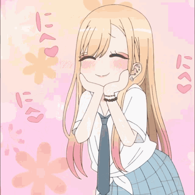a girl with long blonde hair and a blue tie is smiling