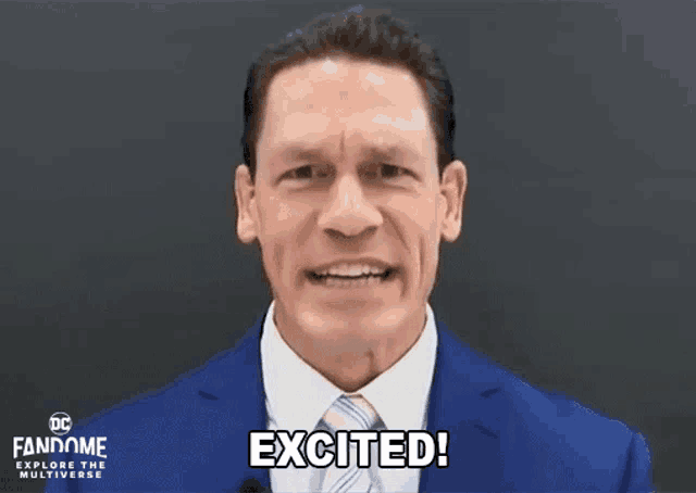 a man in a suit and tie says " excited "