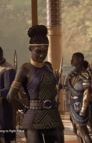 a screenshot of a video game shows a woman with a spear and the words going to fight klaue below her