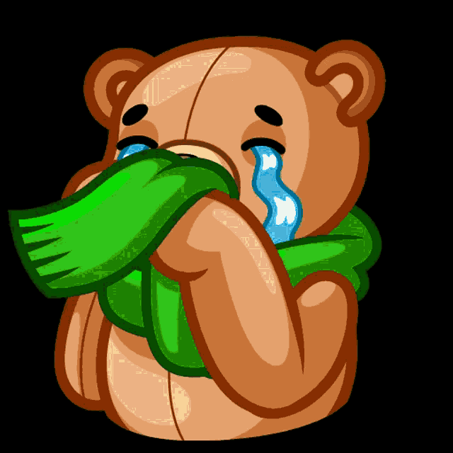 a brown teddy bear with a green scarf around its neck is crying