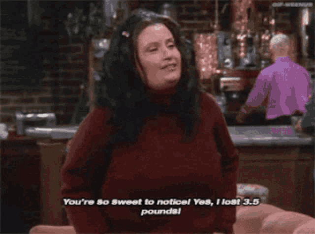 a woman sitting on a couch says you 're so sweet to notice yes , i lost 3.5 pounds
