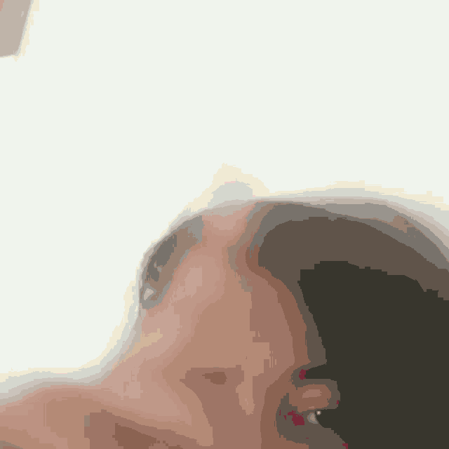 a close up of a woman 's face with a white background