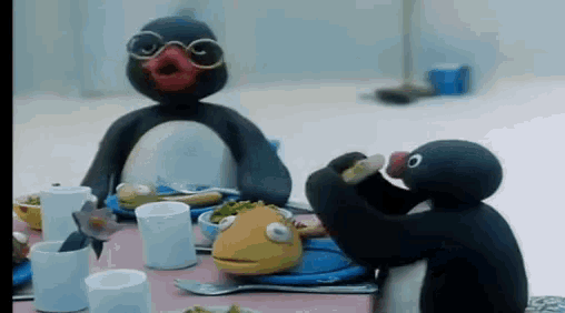 Pingu Penguins GIF - Pingu Penguins Eat Fish GIFs
