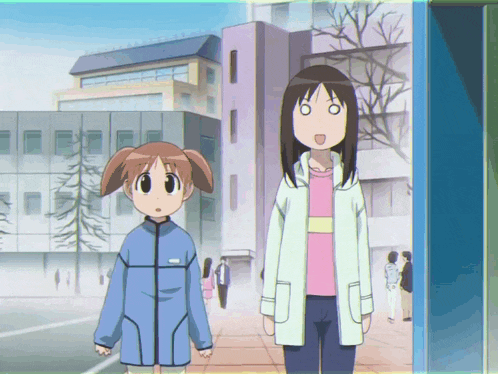 a girl in a pink shirt and a girl in a blue jacket are standing next to each other