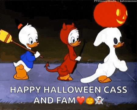 three cartoon ducks are dressed in halloween costumes and walking down a sidewalk .