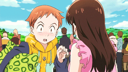 a girl in a pink dress and a boy in a yellow hoodie are standing next to each other