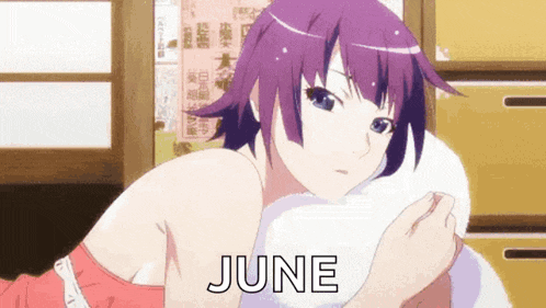 a girl with purple hair is laying on a pillow and the word june is visible