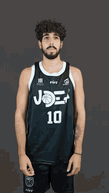 a basketball player wearing a jersey with the number 10 on it
