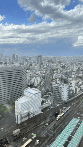 an aerial view of a city with a lot of buildings