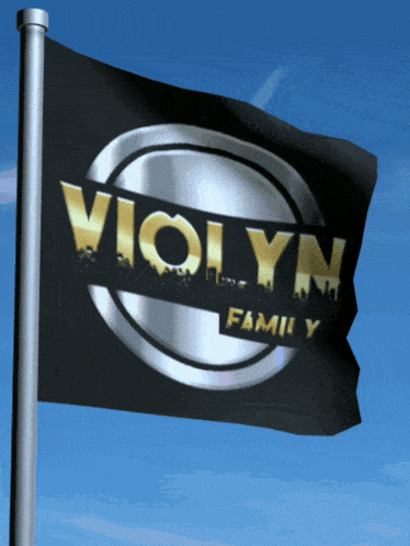a black violyn family flag is flying in the wind